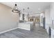 Open concept kitchen with island, looking toward living area at 8474 W Switchback Trl, Casa Grande, AZ 85194