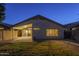 Rear view of house showcasing patio and yard at 896 E Windsor Dr, Gilbert, AZ 85296