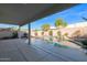 Covered patio with a view of the pool and foliage in the backyard at 914 E Ross Ave, Phoenix, AZ 85024