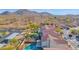 Backyards with refreshing pools, desert landscaping, and beautiful mountain views in the distance at 914 E Ross Ave, Phoenix, AZ 85024