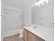 Clean bathroom featuring a vanity with storage, a large mirror, and a shower-tub combination at 914 E Ross Ave, Phoenix, AZ 85024