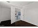 Bedroom with wood flooring, showcasing an open doorway at 914 E Ross Ave, Phoenix, AZ 85024