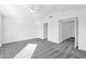 Spacious bedroom with neutral carpet, a ceiling fan, and a doorway leading to another room at 914 E Ross Ave, Phoenix, AZ 85024