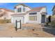 View of the neutral-colored two-story home featuring a red tile roof and two car garage at 914 E Ross Ave, Phoenix, AZ 85024