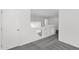 Open hallway with neutral carpet, white walls, and a view of the living space below at 914 E Ross Ave, Phoenix, AZ 85024