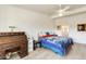 Spacious bedroom with wood floors and ensuite access at 10807 N Fairway W Ct # 212, Sun City, AZ 85351