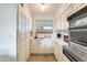 Bright and updated kitchen with white cabinetry at 10807 N Fairway W Ct # 212, Sun City, AZ 85351