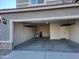 Garage with overhead storage and epoxy flooring at 1081 W Danish Red Trl, San Tan Valley, AZ 85143