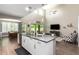 Modern kitchen with island, stainless steel appliances, and ample counter space at 1081 W Danish Red Trl, San Tan Valley, AZ 85143