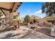 Landscaped backyard with pergola and firepit at 1107 E Lakeview Dr, San Tan Valley, AZ 85143