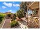 Desert landscaping with a pergola and walkway at 1107 E Lakeview Dr, San Tan Valley, AZ 85143