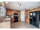 Well-equipped kitchen with ample cabinet space and tile flooring at 1107 E Lakeview Dr, San Tan Valley, AZ 85143