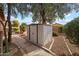 Metal storage shed in the backyard at 1107 E Lakeview Dr, San Tan Valley, AZ 85143