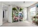 Stylish built-in bookcase with various books and plants at 1110 S Jay St, Chandler, AZ 85286