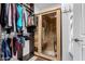 Walk-in closet featuring built-in shelving and a private sauna at 1110 S Jay St, Chandler, AZ 85286