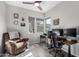 Home office featuring a comfortable chair, workspace, and natural light at 1110 S Jay St, Chandler, AZ 85286