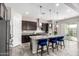 Spacious kitchen with granite island and stainless steel appliances at 1110 S Jay St, Chandler, AZ 85286