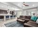 Open concept kitchen with island, dark cabinetry, and granite counters at 1110 S Jay St, Chandler, AZ 85286