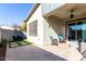 Small patio with seating area and a grassy yard at 1110 S Jay St, Chandler, AZ 85286