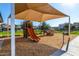 Community playground with slide and shade structure at 1110 S Jay St, Chandler, AZ 85286