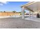 Inviting backyard with sparkling pool and covered patio, ideal for outdoor entertaining and relaxation at 1242 E Bartlett Way, Chandler, AZ 85249