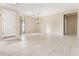 Open living area with a tile entry, neutral walls, and modern chandelier at 1242 E Bartlett Way, Chandler, AZ 85249