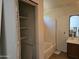 Bathroom with a bathtub, double vanity, and linen closet at 1244 S Portland Ave, Gilbert, AZ 85296