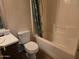 Bathroom features a toilet and bathtub at 1244 S Portland Ave, Gilbert, AZ 85296