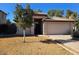 One-story house with a two-car garage and a front yard at 1244 S Portland Ave, Gilbert, AZ 85296