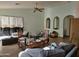 Living room with vaulted ceiling and a sitting area at 1244 S Portland Ave, Gilbert, AZ 85296