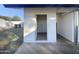 Exterior laundry room with white painted block walls at 130 N 95Th Pl, Mesa, AZ 85207