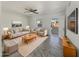 Bright living room featuring tile floors and modern furniture at 130 N 95Th Pl, Mesa, AZ 85207