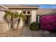 Front entrance with double palm trees and walkway at 15506 W Skyview Way, Surprise, AZ 85374