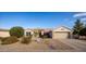 Single-story home with two-car garage and desert landscaping at 15506 W Skyview Way, Surprise, AZ 85374