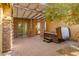 Covered patio with hot tub and pergola at 17730 W Redwood Ln, Goodyear, AZ 85338