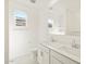 Modern bathroom featuring dual sinks, stylish fixtures, and ample counter space at 17803 W Elm St, Goodyear, AZ 85395