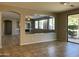 Dining area with view of living room and backyard access at 18546 E Oak Hill Ln, Queen Creek, AZ 85142