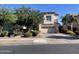 Two-story house with landscaped yard and two-car garage at 18546 E Oak Hill Ln, Queen Creek, AZ 85142