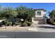 Two-story house with landscaped yard and two-car garage at 18546 E Oak Hill Ln, Queen Creek, AZ 85142