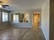 Living room with tile floor and view of staircase at 18546 E Oak Hill Ln, Queen Creek, AZ 85142