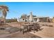 Backyard patio with wooden dining set and umbrella at 2087 E 10Th St, Tempe, AZ 85281