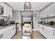 Modern kitchen with white shaker cabinets, butcher block island and stainless appliances at 2087 E 10Th St, Tempe, AZ 85281