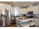 Modern kitchen with stainless steel appliances and island at 2206 S Ellsworth Rd # 72B, Mesa, AZ 85209