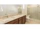 Bathroom with dual sinks, granite countertop, and walk-in shower at 22665 E Stacey Rd, Queen Creek, AZ 85142