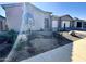 Front view of a single-story home with rock landscaping at 22665 E Stacey Rd, Queen Creek, AZ 85142