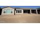 Back of house view, showcasing large windows and patio at 22665 E Stacey Rd, Queen Creek, AZ 85142