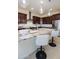 Gourmet kitchen with granite countertops, stainless steel appliances, and pendant lighting at 22665 E Stacey Rd, Queen Creek, AZ 85142