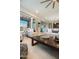 Bright living room with large windows, comfortable seating, and modern decor at 22665 E Stacey Rd, Queen Creek, AZ 85142