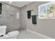 Bathroom with a large walk-in shower and hexagonal floor tiles at 2366 E Becker Ln, Phoenix, AZ 85028