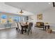 Bright dining room with hardwood floors, a large table, and decorative accents at 2366 E Becker Ln, Phoenix, AZ 85028